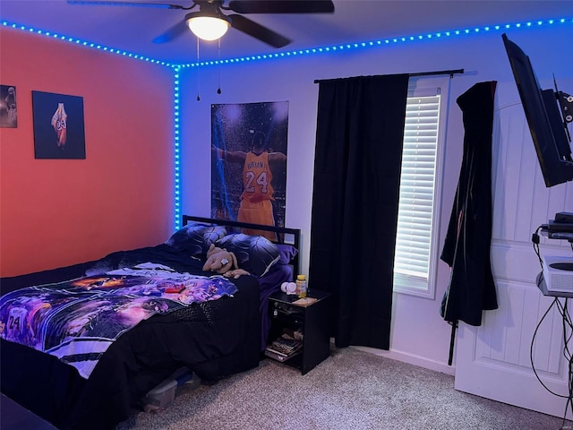 bedroom with ceiling fan and carpet floors