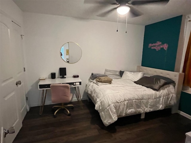 bedroom featuring ceiling fan and dark hardwood / wood-style flooring