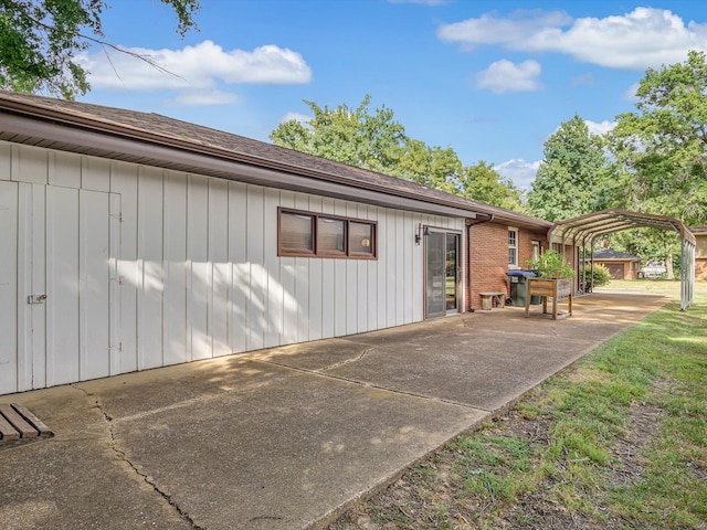 view of property exterior with a carport