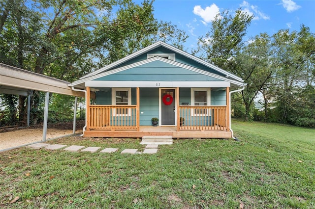 bungalow-style home with a front yard and a porch