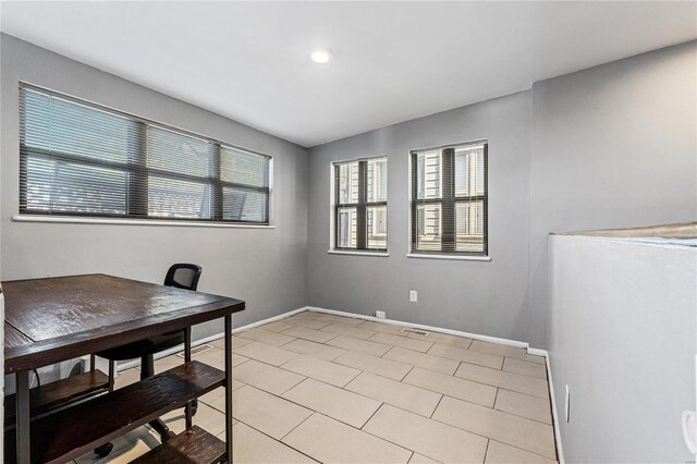 office with light tile patterned floors