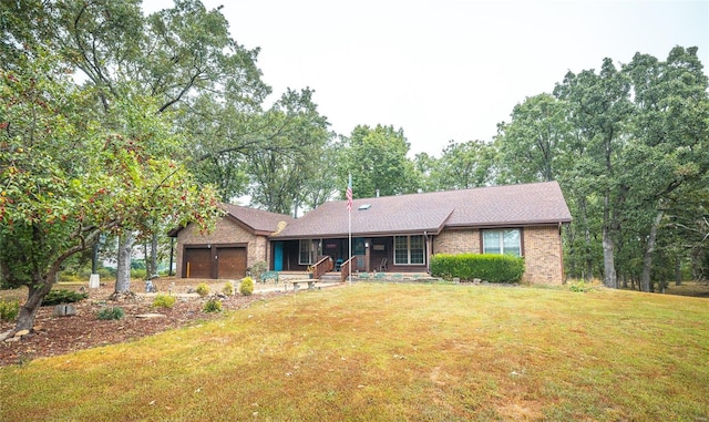 ranch-style home featuring a garage, brick siding, and a front lawn