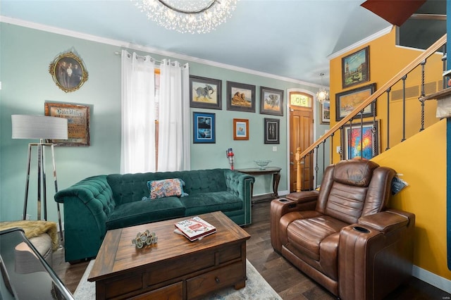 living room with ornamental molding, dark wood-type flooring, and a chandelier