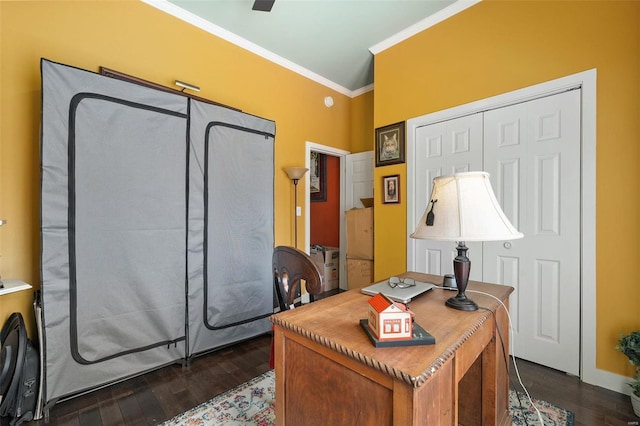 home office featuring dark hardwood / wood-style floors and crown molding