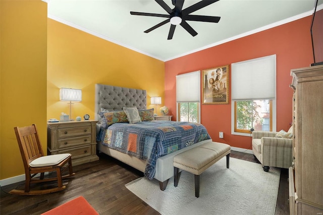 bedroom featuring ornamental molding, ceiling fan, and dark wood-type flooring