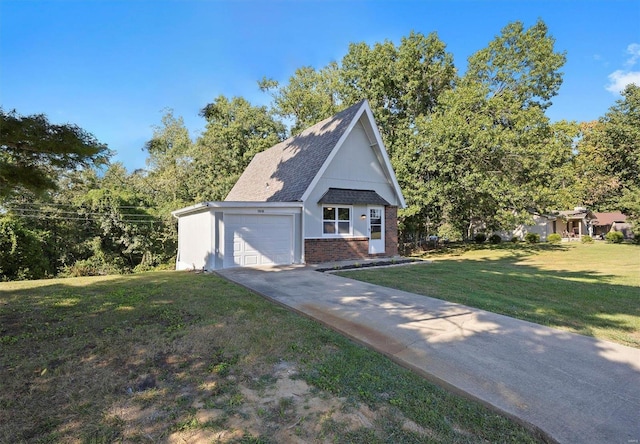 view of front of home featuring a front yard, driveway, a shingled roof, a garage, and brick siding