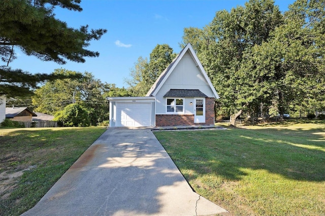 view of front of house with a front lawn and a garage