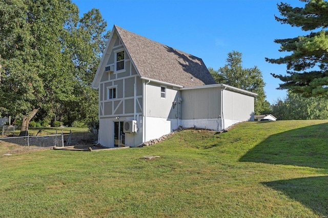 view of home's exterior with a lawn