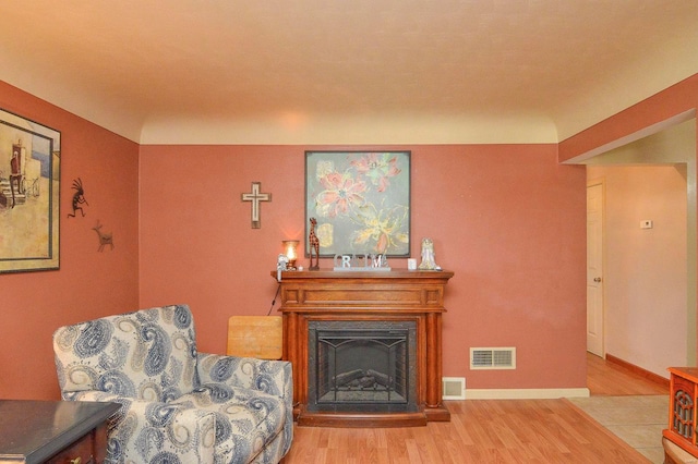 living area featuring hardwood / wood-style flooring