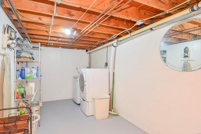 basement with washer and clothes dryer