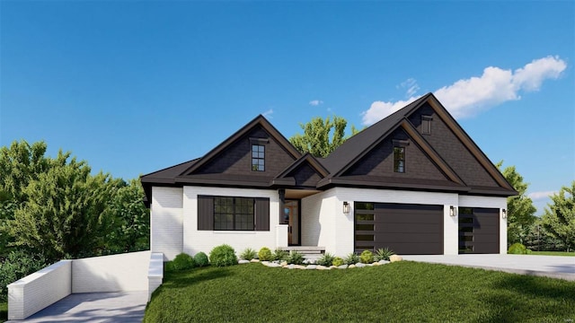 view of front of home featuring a garage and a front yard