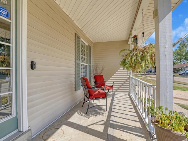 view of patio featuring a porch