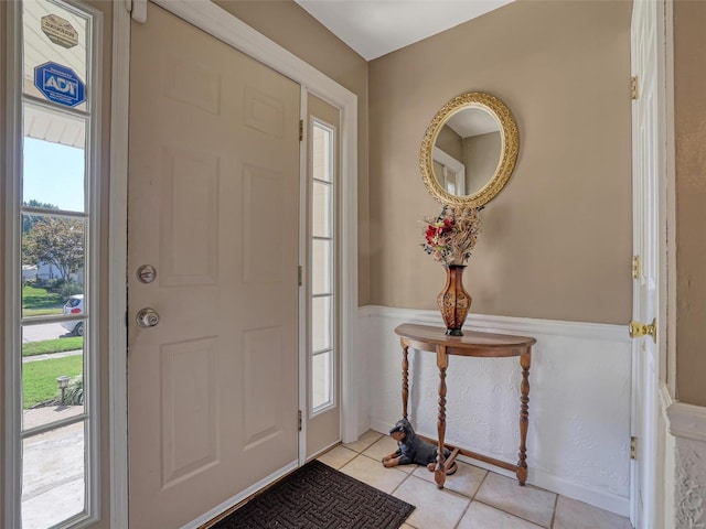 entrance foyer with light tile patterned floors