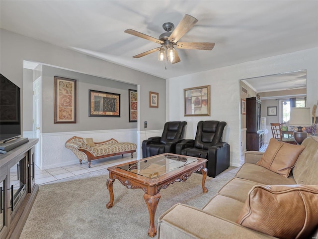 living room with light tile patterned flooring and ceiling fan