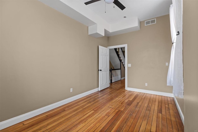 interior space with light wood-type flooring and ceiling fan