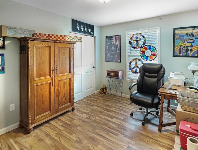 home office featuring hardwood / wood-style flooring