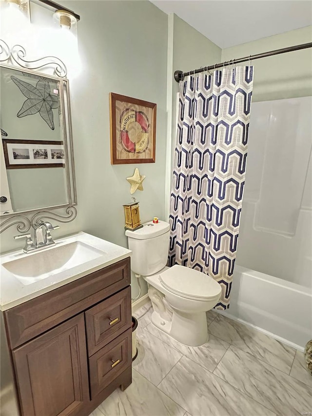 full bathroom featuring vanity, toilet, and shower / tub combo with curtain