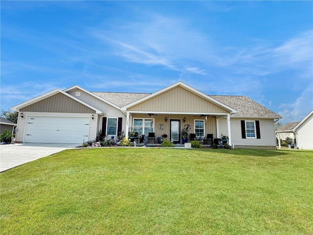 single story home featuring a front lawn, a porch, and a garage