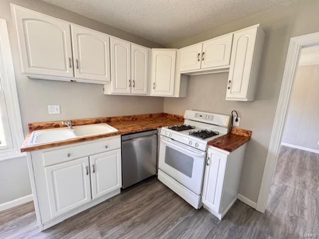 kitchen featuring white cabinetry, dark wood-type flooring, white range with gas stovetop, stainless steel dishwasher, and sink