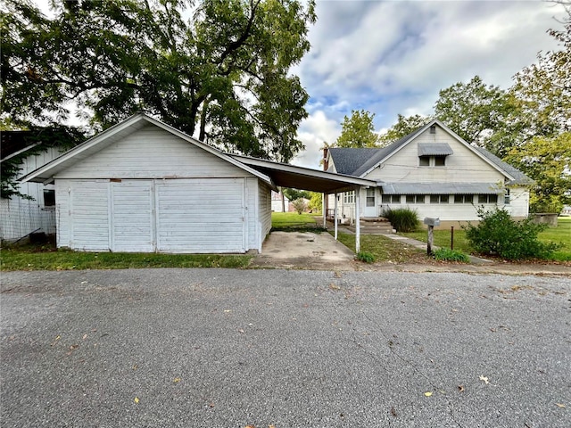 view of front of house featuring a carport