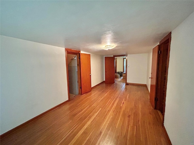 unfurnished room featuring light hardwood / wood-style flooring