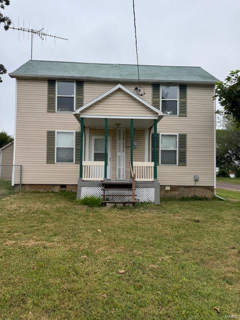 view of front of home featuring a front yard and a porch