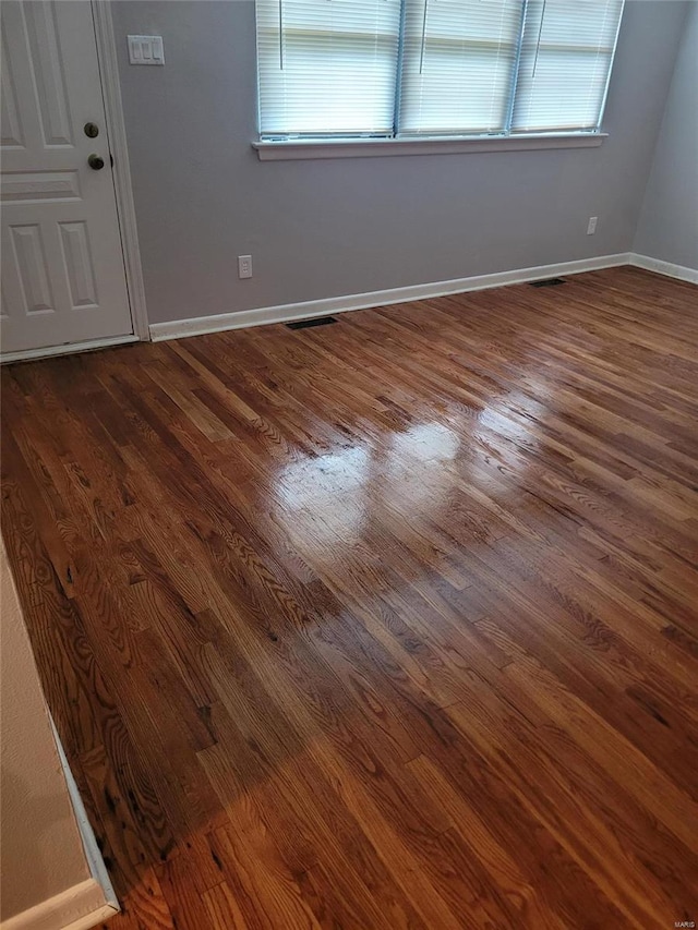 entryway featuring dark wood-type flooring