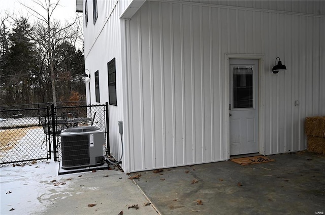 exterior space with a patio and central air condition unit