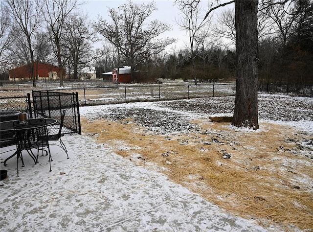 view of snowy yard