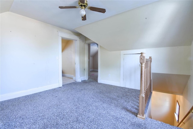 bonus room featuring carpet flooring, ceiling fan, and vaulted ceiling