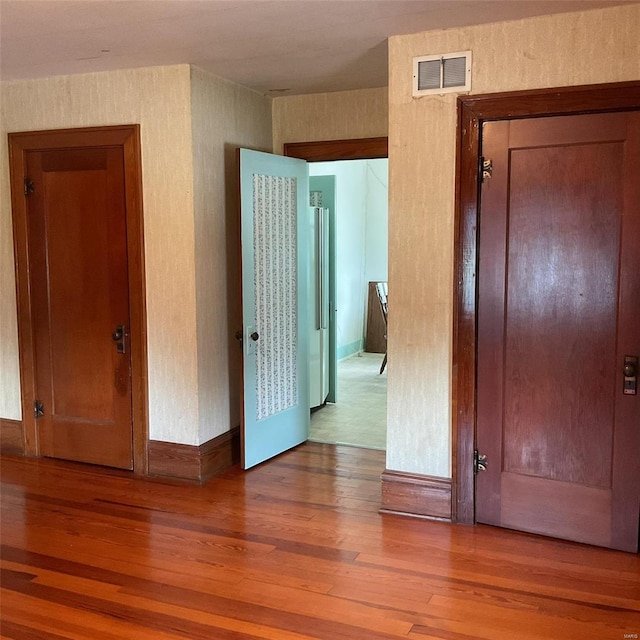 interior space with hardwood / wood-style flooring