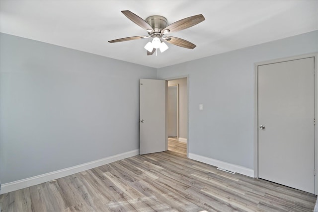 unfurnished bedroom featuring ceiling fan and light hardwood / wood-style flooring