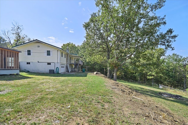 view of yard featuring central AC