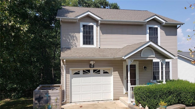 view of front of property with a garage