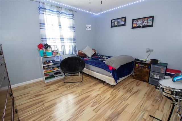 bedroom featuring light hardwood / wood-style flooring