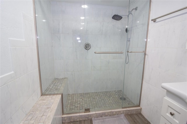 bathroom featuring vanity and walk in shower