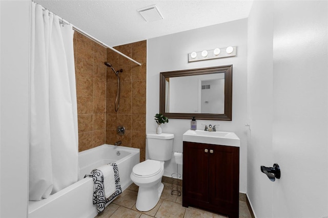 full bathroom with toilet, tile patterned flooring, shower / tub combo, vanity, and a textured ceiling