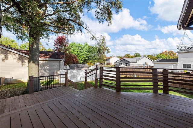 wooden deck featuring central AC