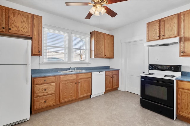 kitchen featuring ceiling fan, sink, and white appliances