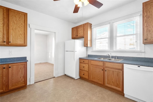 kitchen with ceiling fan, sink, light carpet, and white appliances