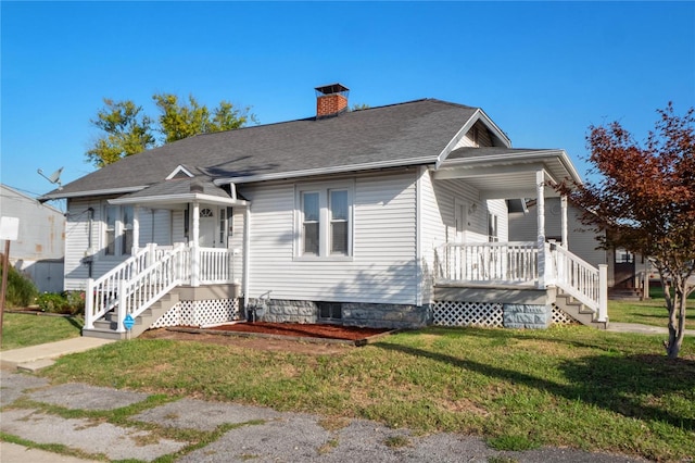 view of front facade featuring a front yard