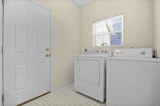 washroom featuring independent washer and dryer