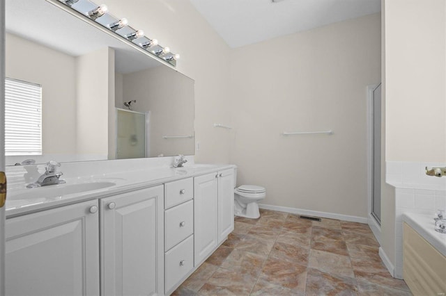 full bathroom with vanity, toilet, and independent shower and bath