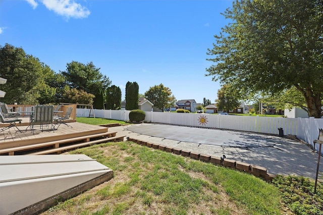 view of yard with a deck