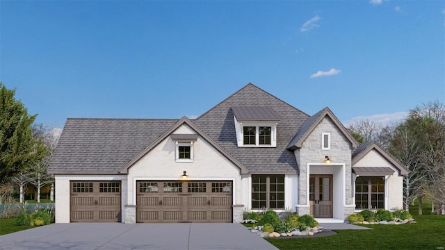 view of front of house featuring a garage and a front yard