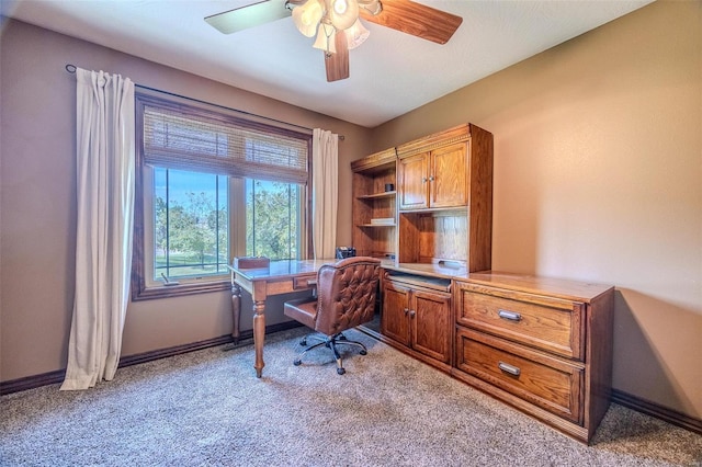 home office featuring ceiling fan and light colored carpet