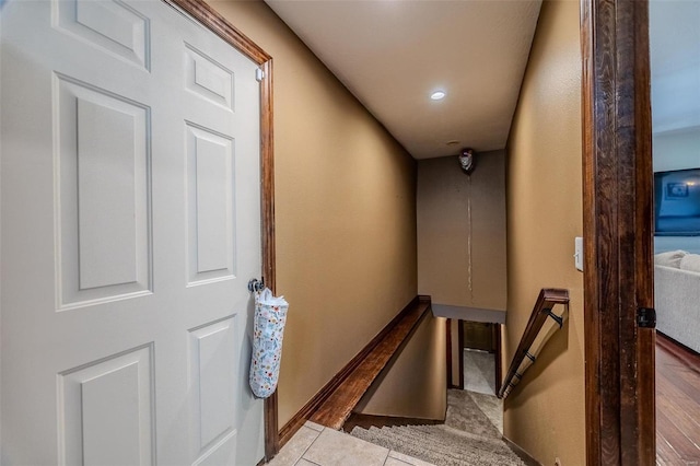 hallway with light hardwood / wood-style flooring