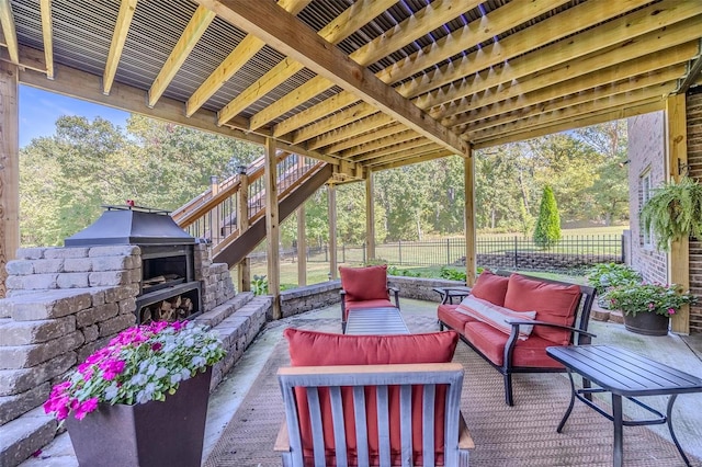 exterior space featuring an outdoor living space with a fireplace