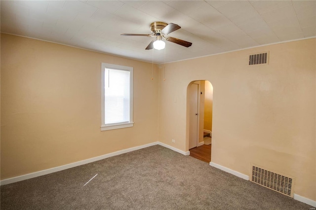 carpeted empty room with ceiling fan