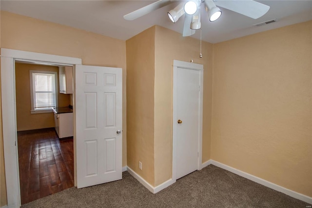 unfurnished bedroom with a closet, ceiling fan, and hardwood / wood-style floors